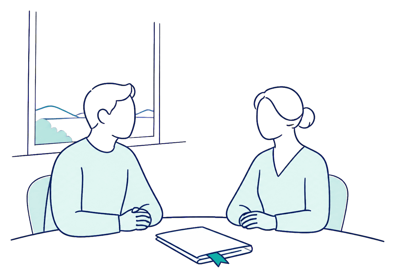 Two people talking across a table, prepared and on equal footing
